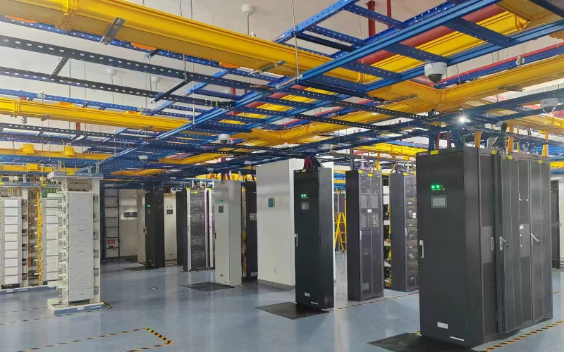 Armored fiber optic patch cords routed through a data center equipment rack Armored fiber optic patch cords routed through a data center equipment rack